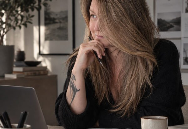 Business owner thinking about the complexity of modern marketing and how different marketing functions work together.